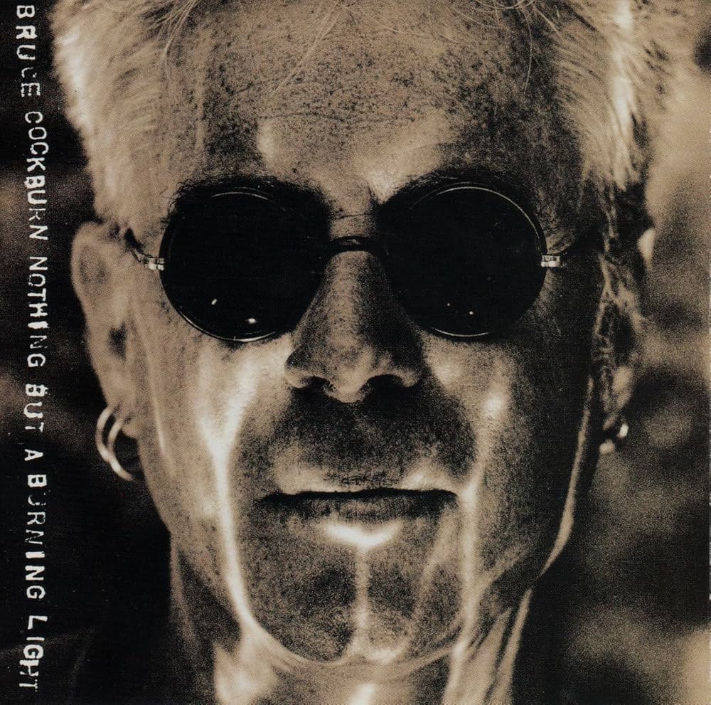 COCKBURN, BRUCE - NOTHING BUT A BURNING LIGHT - USED CD