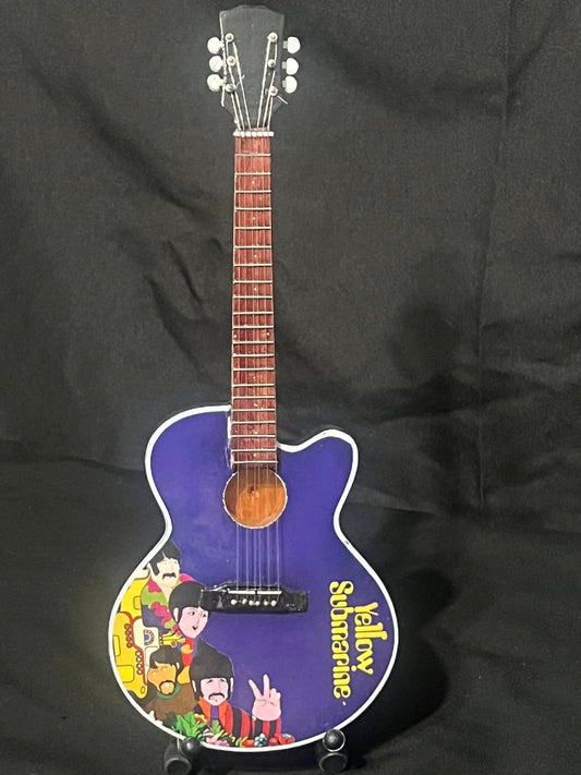 THE BEATLES- YELLOW SUBMARINE MINI REPLICA GUITAR